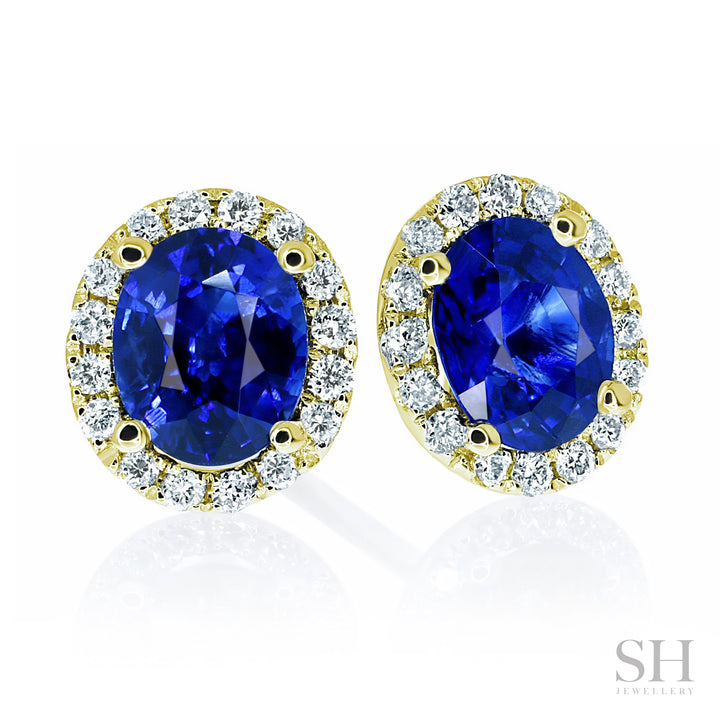 Glamorous Oval Royal Blue Sapphire and Diamond Halo Stud Earrings - W0311