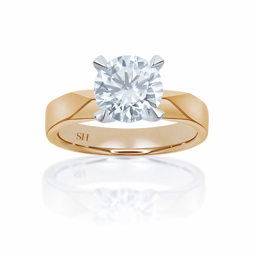 Pictured with 2.02ct diamond|thumb_caption:2.02 carat|grid_preview:true