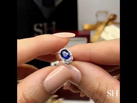 Glamorous Oval Royal Blue Sapphire and Diamond Halo Stud Earrings - W0311