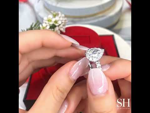 Bold Pear Shaped Halo & Pavé-Set Diamond Band - W0578